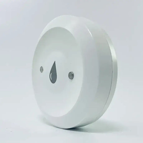 a white plastic tape with a hole in the middle