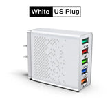 white plug with four usbs and a usb