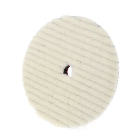 a white polish pad on a white background