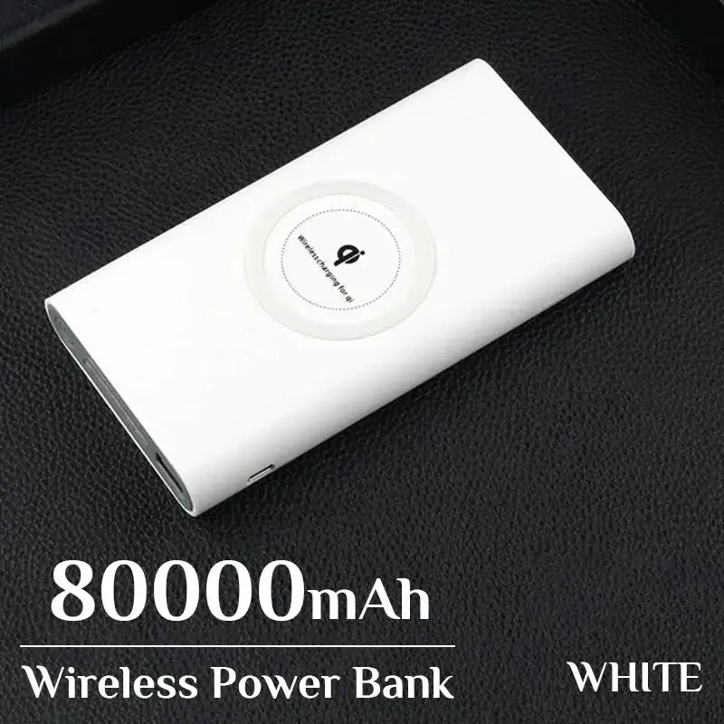 a white power bank sitting on top of a black leather couch