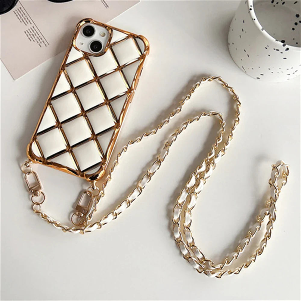 White quilted phone case with gold chain strap.