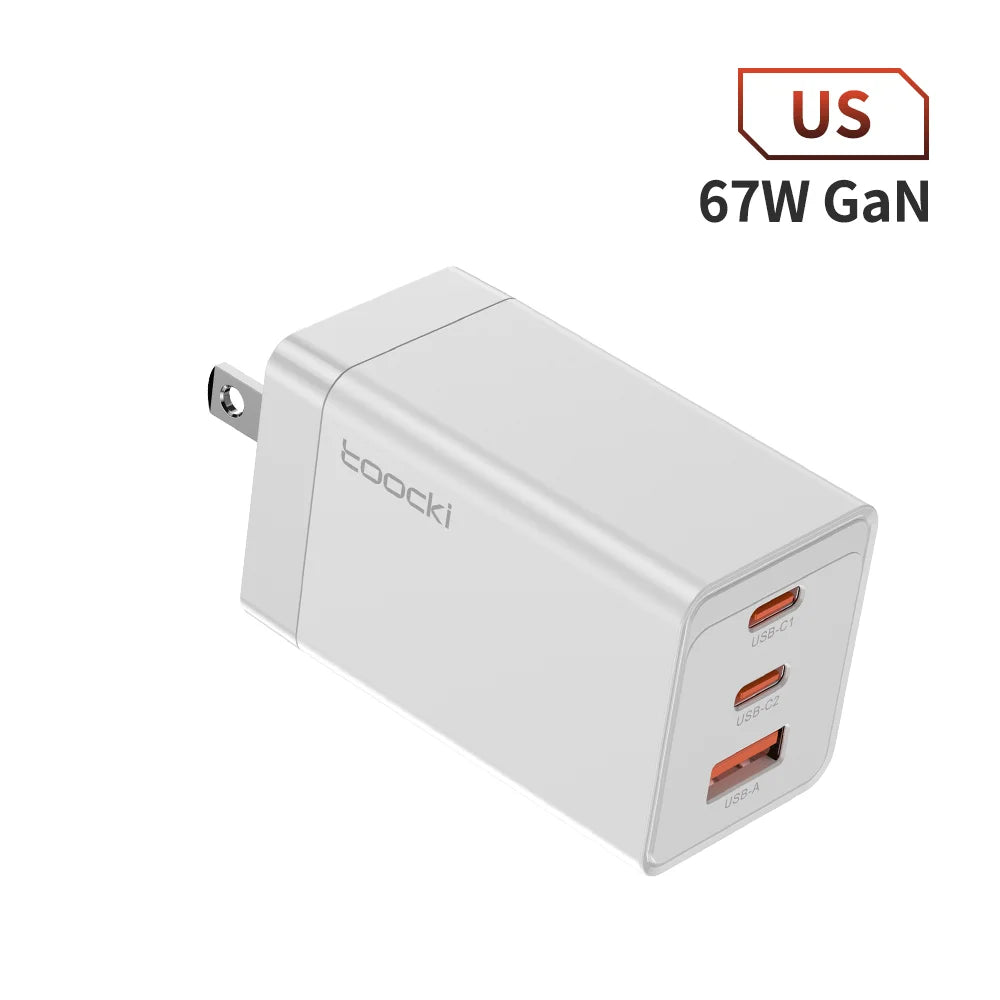 White rectangular USB charger with three ports, labeled as 67W GaN and featuring the Topoki brand.