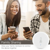 White, round smart home device with thermometer icon.