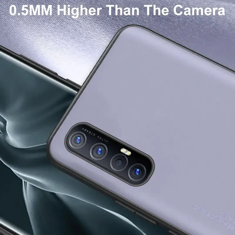 the back of a white samsung phone with a camera lens