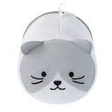 a white cat shaped mesh hat with a black nose