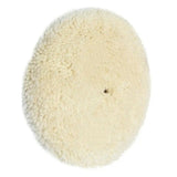 a white sheep rug on a white background