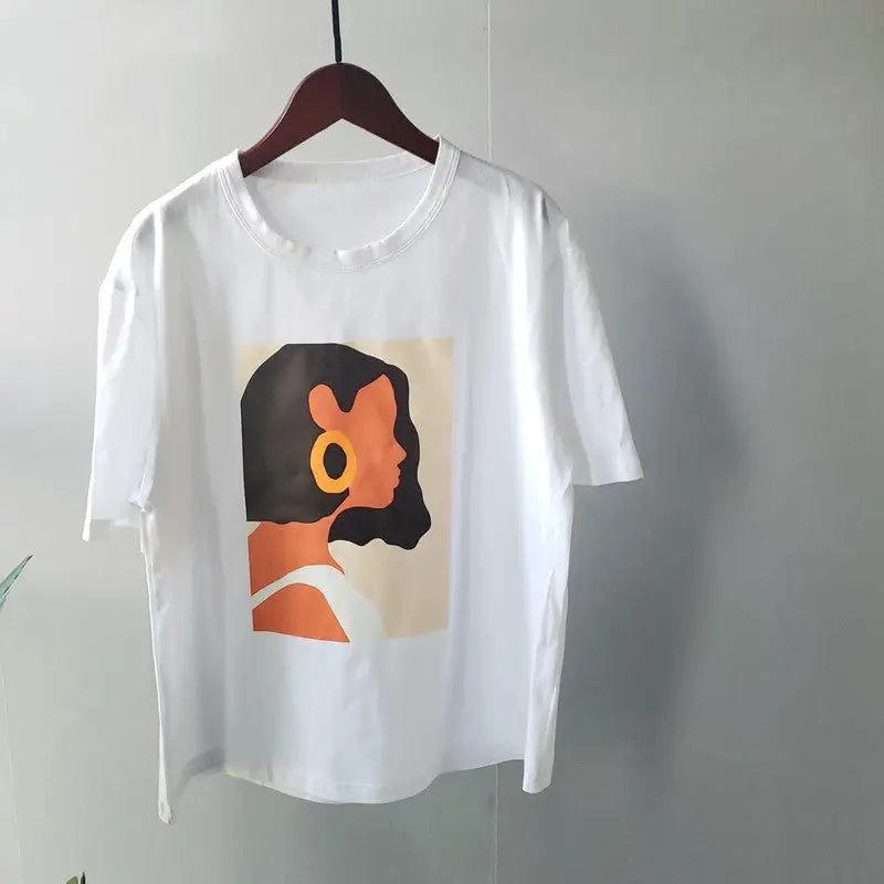 a white t - shirt with a woman’s face on it