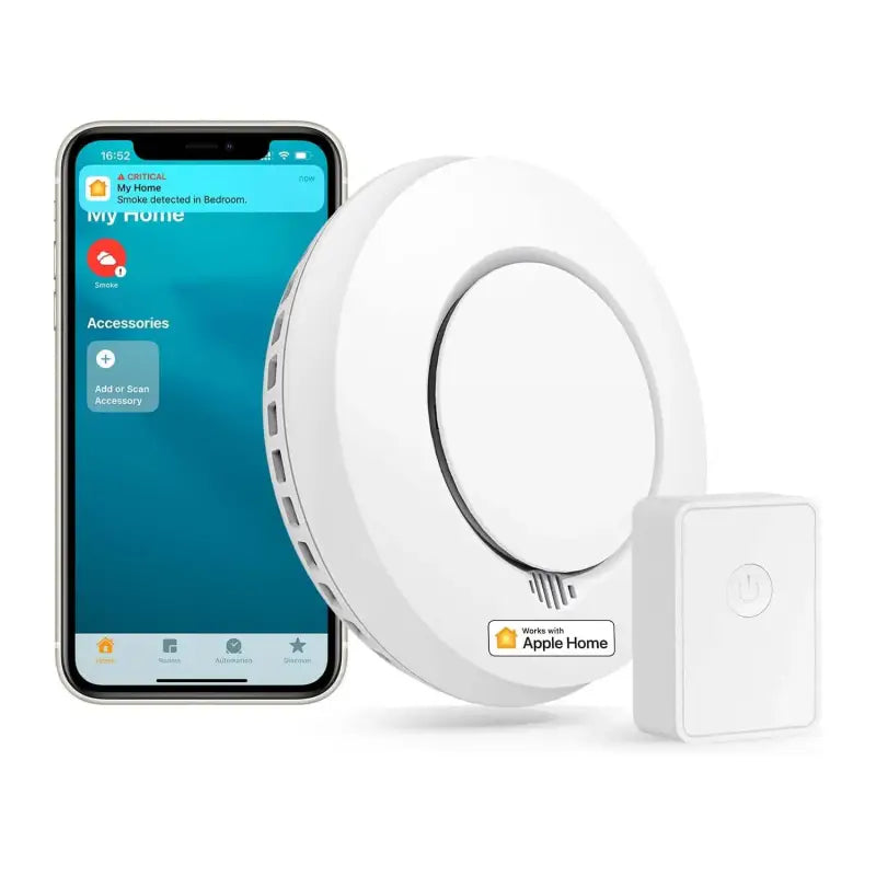 a white smart home alarm with a phone next to it