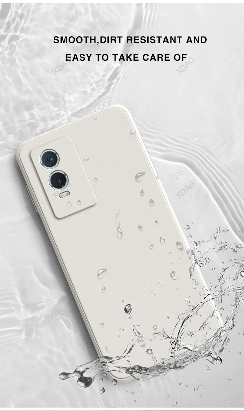 White smartphone with dual cameras being splashed with water.