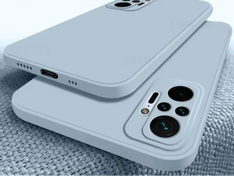 White smartphone with multiple camera lenses on its back panel.