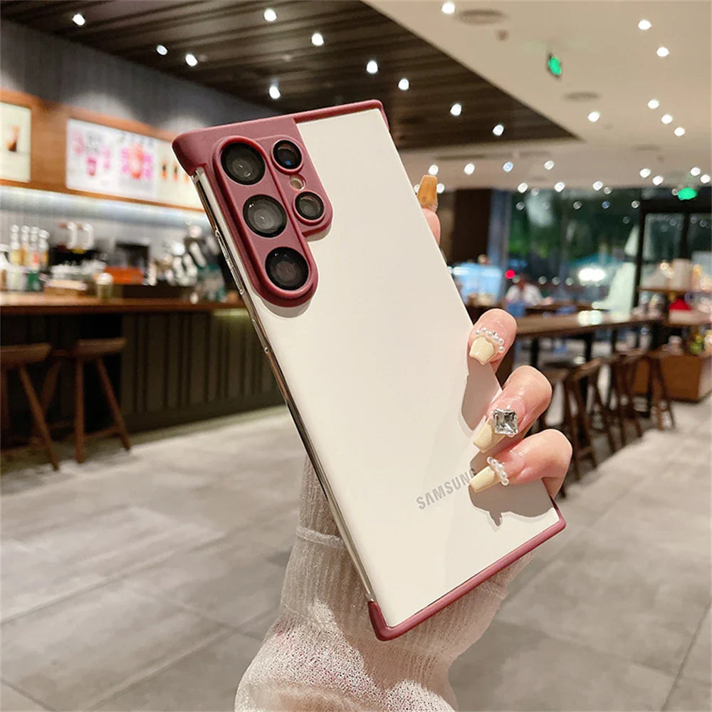 White smartphone with a prominent red camera module and border.