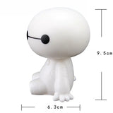 a close up of a white toy with a black eye patch