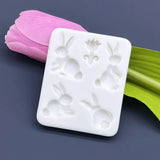 a white soap bar with a pink tulipa flower