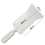 a white plastic spat with a measuring ruler