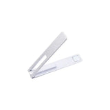 there is a white stapler with a white handle on a white surface