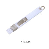 a white usb stick with a white handle