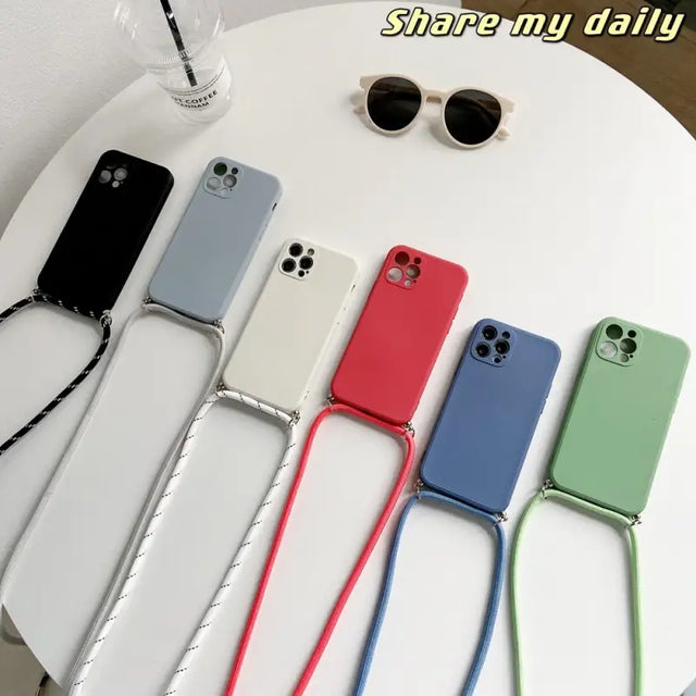 a white table with four different colored cases