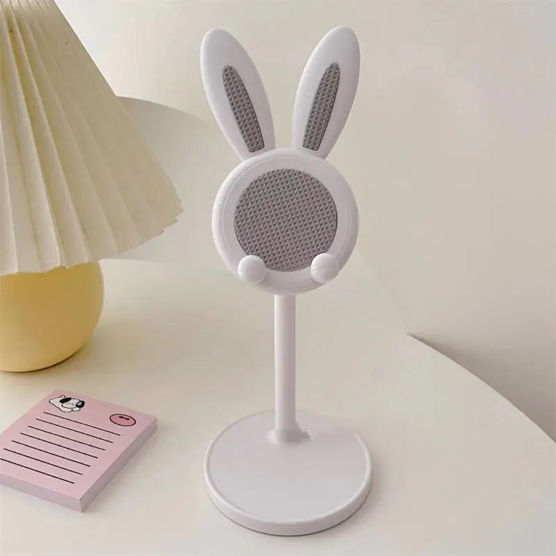 a white lamp with a rabbit head on it