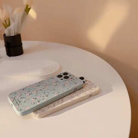 a white table with a phone on it