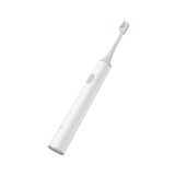 a white toothbrush with a blue toothbrush