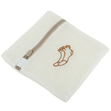 the white towel with a brown cat embroidered on it