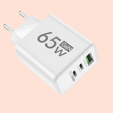 White USB wall charger with ’65W GaN’ printed on it and multiple charging ports.