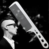 a man with a comb and sunglasses on his head