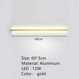 a white wall light with a yellow strip on it