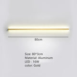 a white wall light with a yellow strip on it