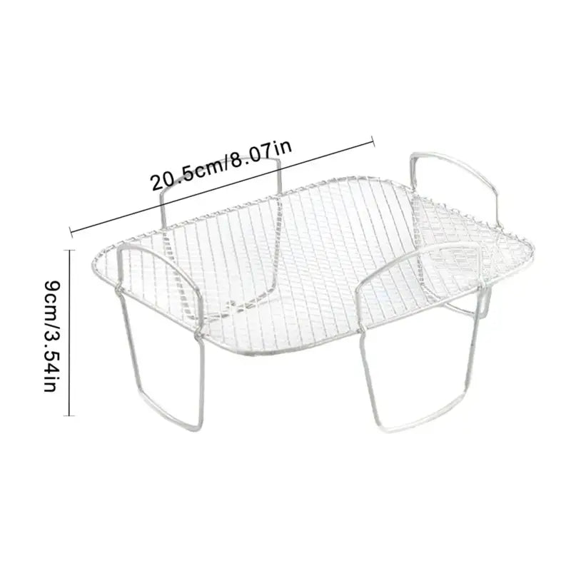 a white wire basket with a wire basket on top