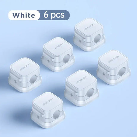 The white wireless device with five different buttons