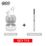 White wireless earbuds with charging case and cleaning pen.