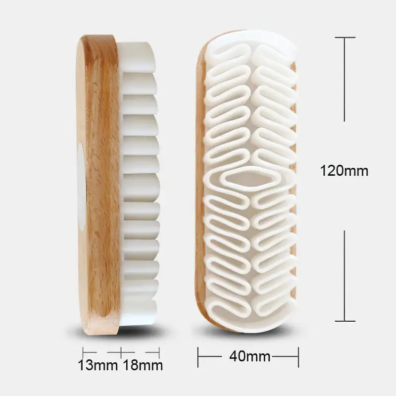 a white and wooden toothbrush with a wooden handle