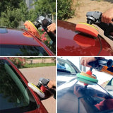a person is cleaning a car with a sponge