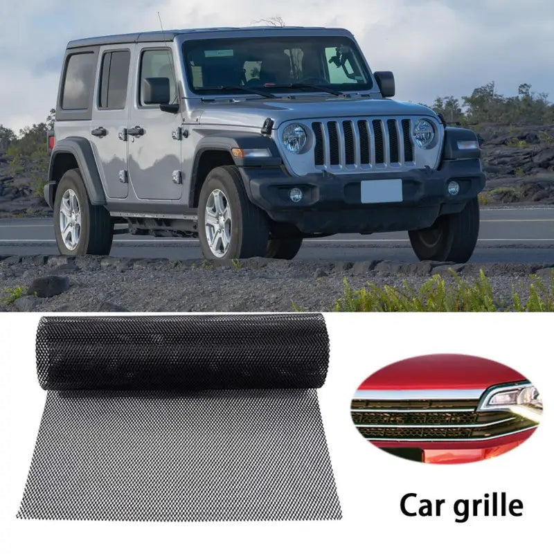 a black car front bumper cover with a black mesh
