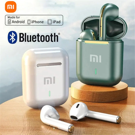 Wireless Bluetooth earbuds with charging cases in white and green colors.