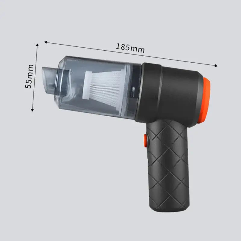 a close up of a black and orange electric drill with a measuring scale