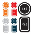 a set of four different colored buttons with a white background