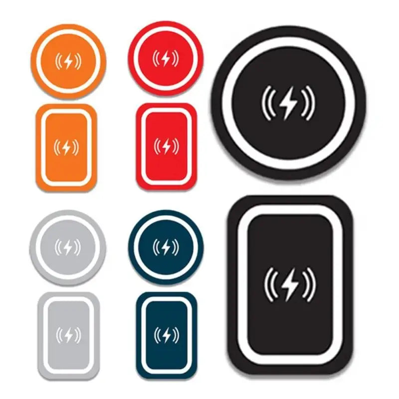 a set of four different colored buttons with a white background