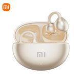 Wireless earbuds in a charging case with the Xiaomi (Mi) logo.