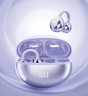 Wireless earbuds in a metallic silver charging case with the ’mi’ logo.