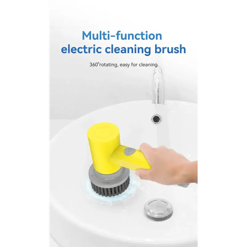 a person using a yellow brush to clean a sink