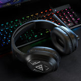 Wireless gaming headphones with illuminated controls on the ear cup.