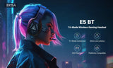 Wireless gaming headset with illuminated logo worn by a person with colorful hair in a futuristic setting.