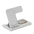 Wireless charging stand with a circular display and an upright arm for holding a device.