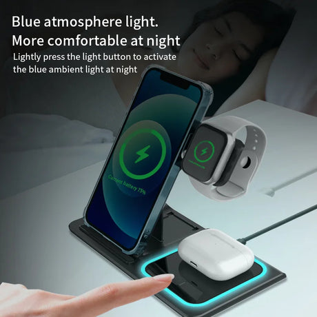 Wireless charging station with blue ambient light for multiple devices including a smartphone, smartwatch, and earbuds case.