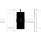 the wireless charging station is shown with a smartphone and a charging cable