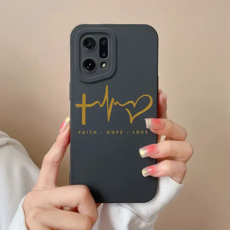 a woman holding a black phone case with the faith hope logo