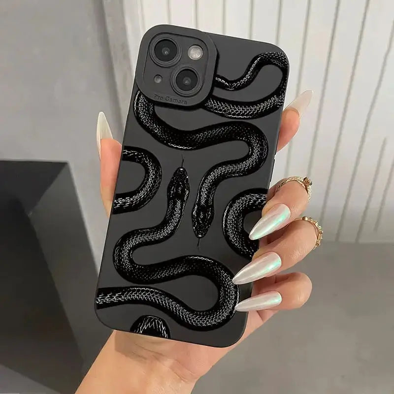 a woman holding a black snake phone case