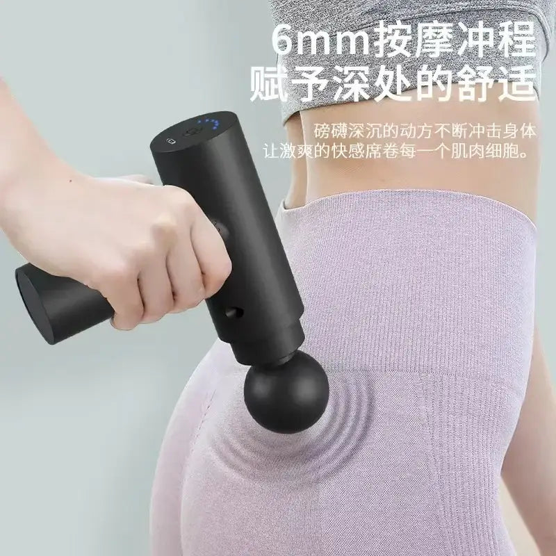 a woman holding a black and white electric massager